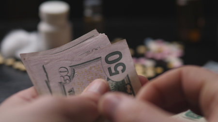 dollar bills of the drug dealers recount closeの写真素材