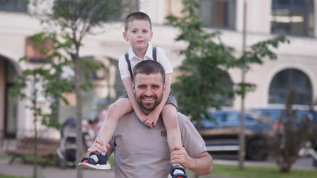 A Father and His Son are Joyfully Enjoying Quality Time Together Outdoorsの写真素材