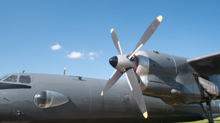 Vintage Soviet Aircraft on Display Under a Clear Blue Sky Showcasing Its Propeller and Fuselage Design From a Bygone Era of Aviation History in Russiaの写真素材