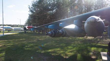 Vintage Soviet Aircraft and Missile Display in a Museum Setting, Showcasing Engineering From the...