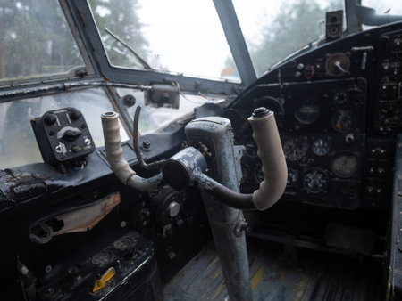 restored vintage dashboard with switches and dials, retro instrument cluster with worn panelsの写真素材