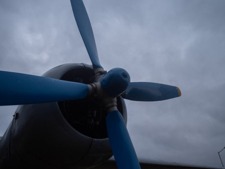 transport aircraft with propeller and gear present, grounded cargo plane with static display and...