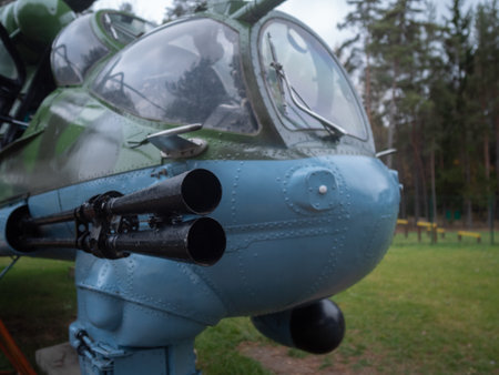 closeup of helicopter nose with armament, detailed view of helicopter nose with sensors and weaponry