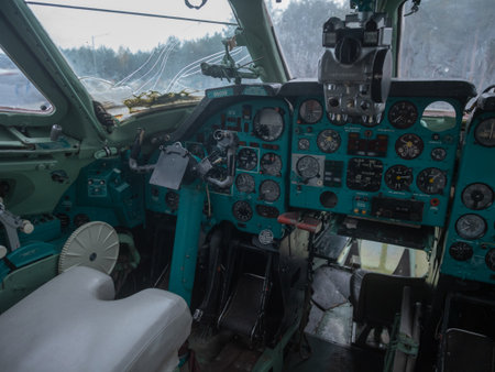 cockpit amid weather, rainstreaked windshield and smeared controls depict challenging operational...
