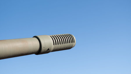 Camouflage Painted Apparatus Designed For Tactical Field Usage. Closeup View Emphasizing Modernized Design Elements And Rugged Functionality Of Military Hardware