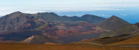 Haleakala Volcano and Crater Maui Hawaii showing moon like surface with mountains, lava tubes, rocks, and surreal like beauty の写真素材