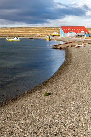 Coastline along the souther tip of Chile with the straits of Magellen in the backgroundの写真素材