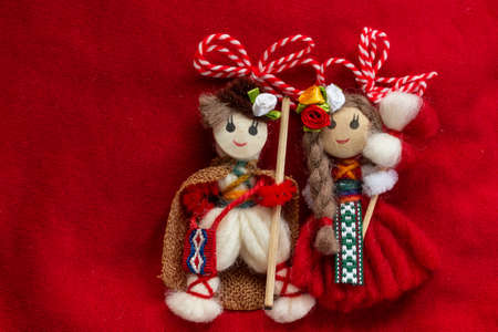 Martenitsa - traditional Bulgarian custom - red background with snowdropsの写真素材