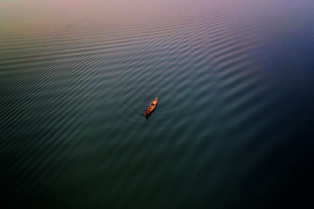 arial drone view of wooden boats moving in chilika lake in deep waterの写真素材