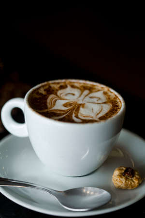 Coffee cup and coffee beans at a coffee shop. Still details. high quality photoの写真素材