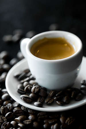 Coffee cup and coffee beans at a coffee shop. Still details. high quality photoの写真素材