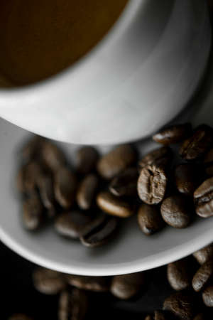 Coffee cup and coffee beans at a coffee shop. Still details. high quality photoの写真素材
