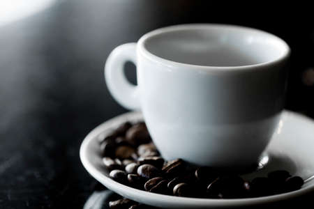 Coffee cup and coffee beans at a coffee shop. Still details. high quality photoの写真素材