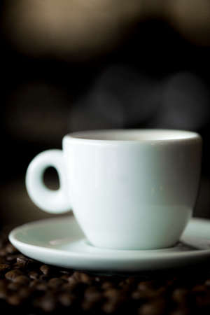 Coffee cup and coffee beans at a coffee shop. Still details. high quality photoの写真素材