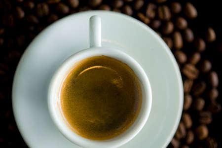 Coffee cup and coffee beans at a coffee shop. Still details. high quality photoの写真素材