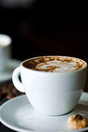 Coffee cup and coffee beans at a coffee shop. Still details. high quality photoの写真素材