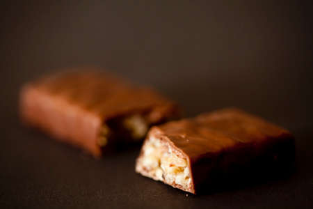 Chocolate bars and pieces. Still detail. High quality photoChocolate bars and piecesの写真素材