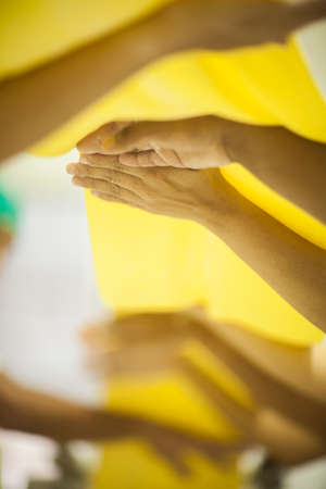 Human Hands making Raw and dry capeletti pasta on kitchen tableの写真素材