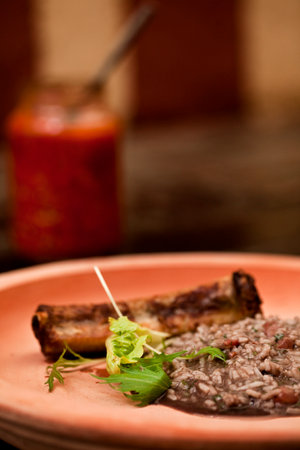 Typical Brazilian dish - rice and beans. Made with black beans. Food background. high quality photoの写真素材