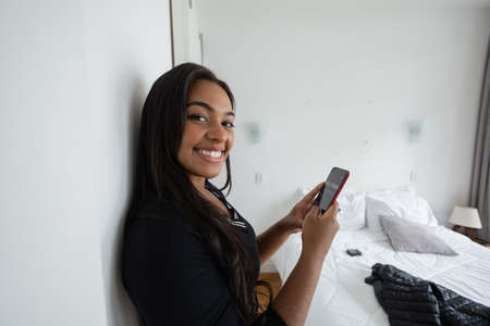 Young white man working at home with laptop on desk. Home office concept. Gray notebook for working. high quality photoの写真素材