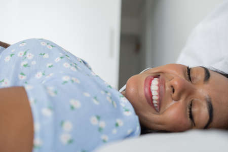 Young white man working at home with laptop on desk. Home office concept. Gray notebook for working. high quality photoの写真素材