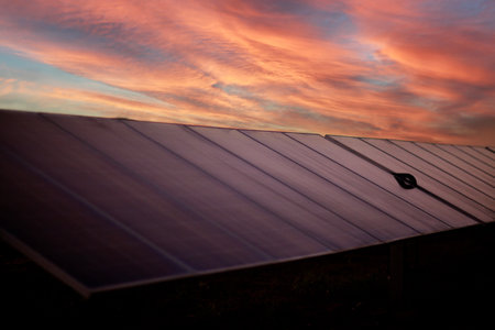Solar panels power generation equipment, in the sun rays, solar panel with sunlight and sky background. concept clean energy power in natureの写真素材