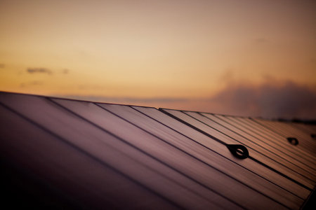 Solar panels power generation equipment, in the sun rays, solar panel with sunlight and sky background. concept clean energy power in natureの写真素材