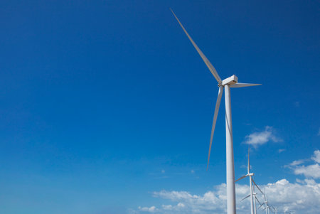 wind turbines farm, wind power generation equipment, clean energy concept, renewable energyの写真素材
