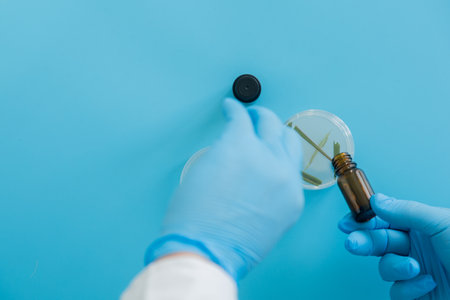 Production line pharmaceutical industry. Manufacturing of drugs and medications, pharmaceuticals. Laboratory gloves Petri dishの写真素材