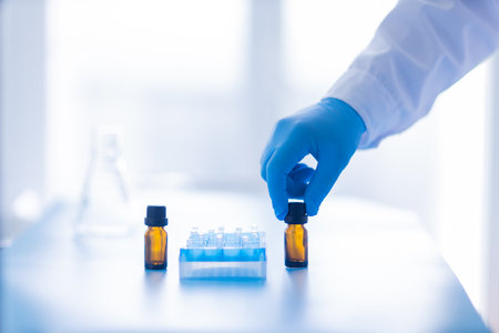Production line pharmaceutical industry. Manufacturing of drugs and medications, pharmaceuticals. laboratory gloves blueの写真素材