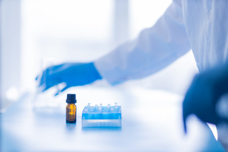 Production line pharmaceutical industry. Manufacturing of drugs and medications, pharmaceuticals. Laboratory gloves blueの写真素材