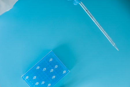 Production line pharmaceutical industry. Manufacturing of drugs and medications, pharmaceuticals. laboratory gloves blueの写真素材