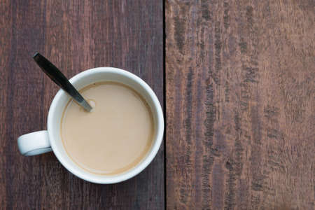 Cup of coffee on wood tableの写真素材