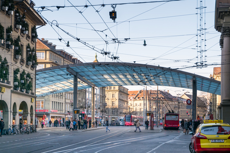 BERN, SWITZERLAND - December 26, 2016 - Bus and tram station at Bern bahnhof railway station city center.のeditorial素材