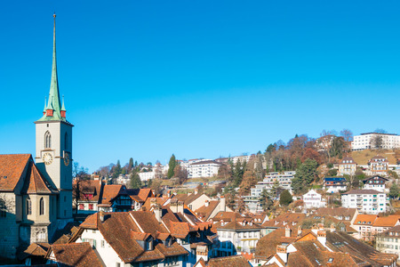 Old town of burn with a clock tower church Switzerland