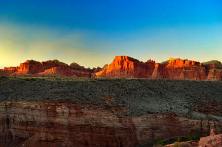 Sunset over mountains at Capitol Reef National Parkの写真素材