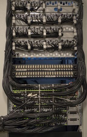 Network Switch and Ethernet Cables Patched into Local Network and IPTVの写真素材