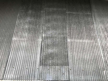 The concept of a galvanized sheet background is fully seized.の写真素材