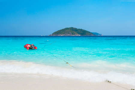 Beautiful tropical seascape. Crystal clear sea and white sand beach at Tachai island, Andaman,...