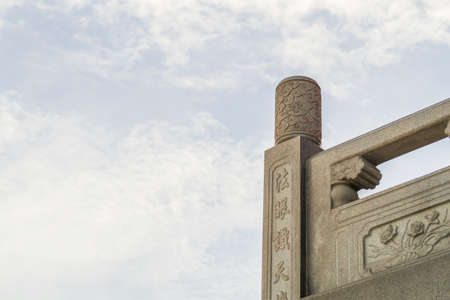Chinese Temple in the bright morning sky with clouds in sunshine day