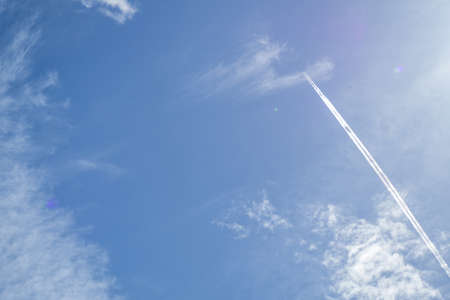 Jets flying in the sky with clouds in the morning sun shine