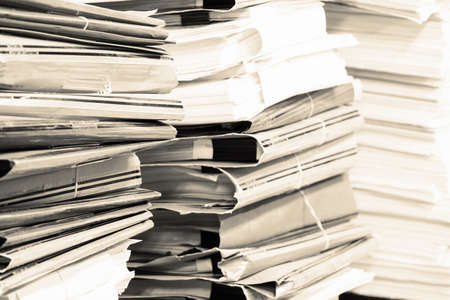Piles of paper in the office in working time