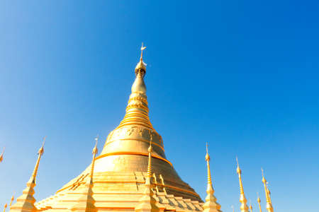 Travel Expo at the place of gold in the blue sky in un light.の写真素材