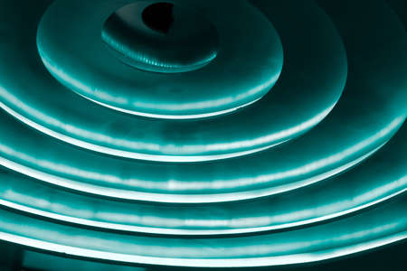 Amazing background in shades of blue indark roomの写真素材