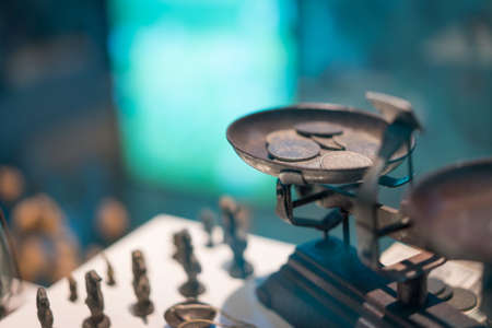 Scales and the Ancient Numismatics in haft scale.