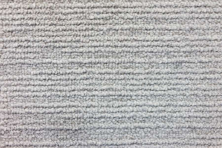 Linear pattern on the cloth against the old texture in soft light.の写真素材