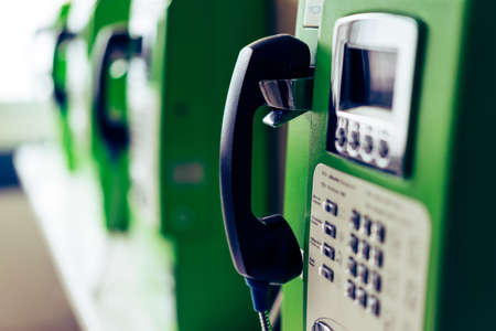 Green public telephone booth in the hospital place.の写真素材