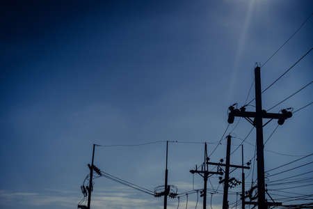 Electric pole in the blue sky in the afternoon day.の写真素材