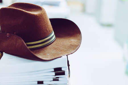 Stack of white paper placed in office and caps in relax time.の写真素材
