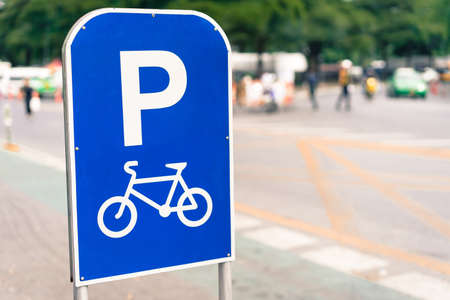Bicycle route sign on the road in sun light.の写真素材